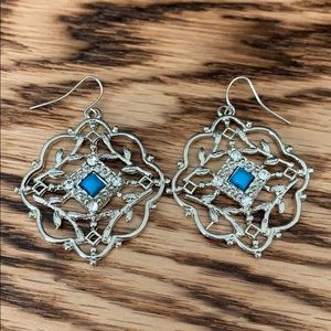 Turquoise colored inset on silver earrings